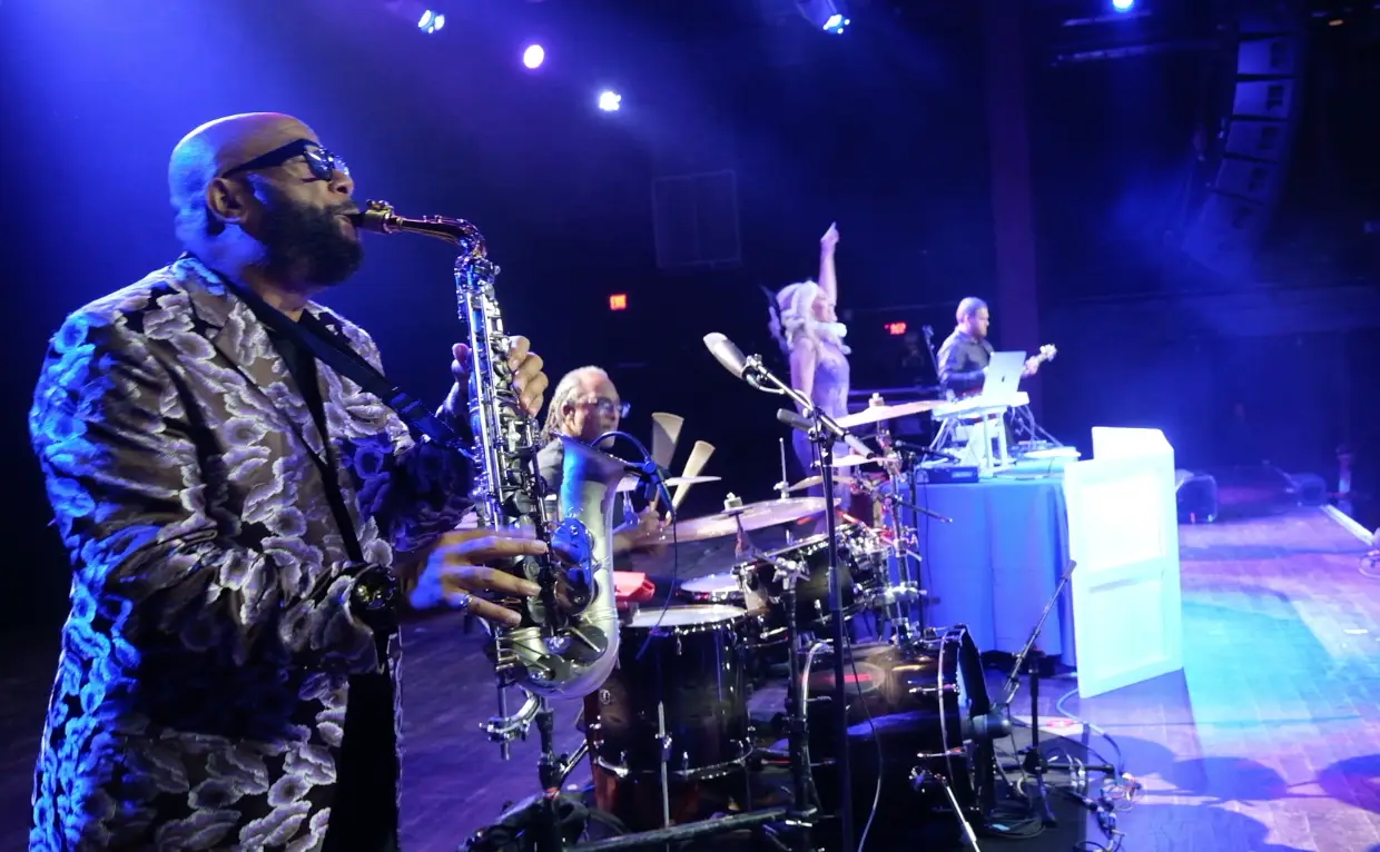 The ElectriX performing live at The Fillmore in Philadelphia with DeeJay Shelly on DJ decks, John “Sax” Williams on drums, and Paul on electric guitar.