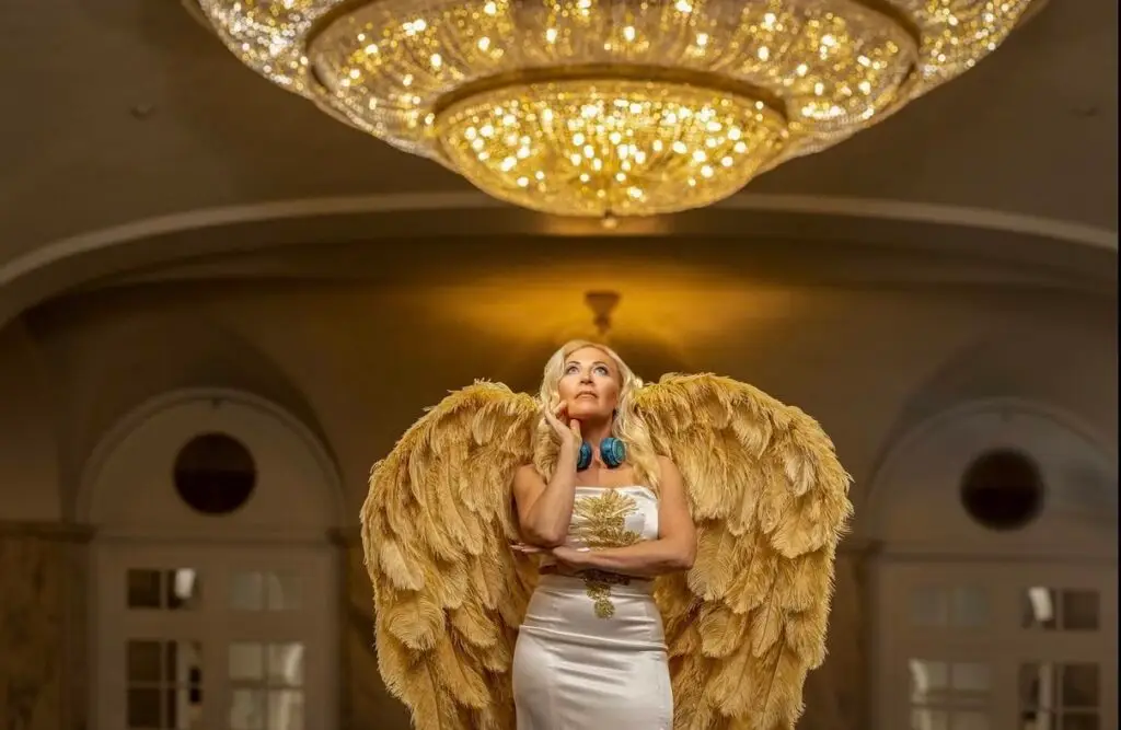 Michelle Lee, aka DJ Shelly, wearing her signature gold wings during a Modern Luxury Philadelphia Power Players editorial photoshoot in 2022