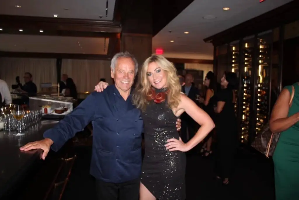 DJ Shelly posing with renowned chef Wolfgang Puck at a Washington, DC restaurant opening event.
