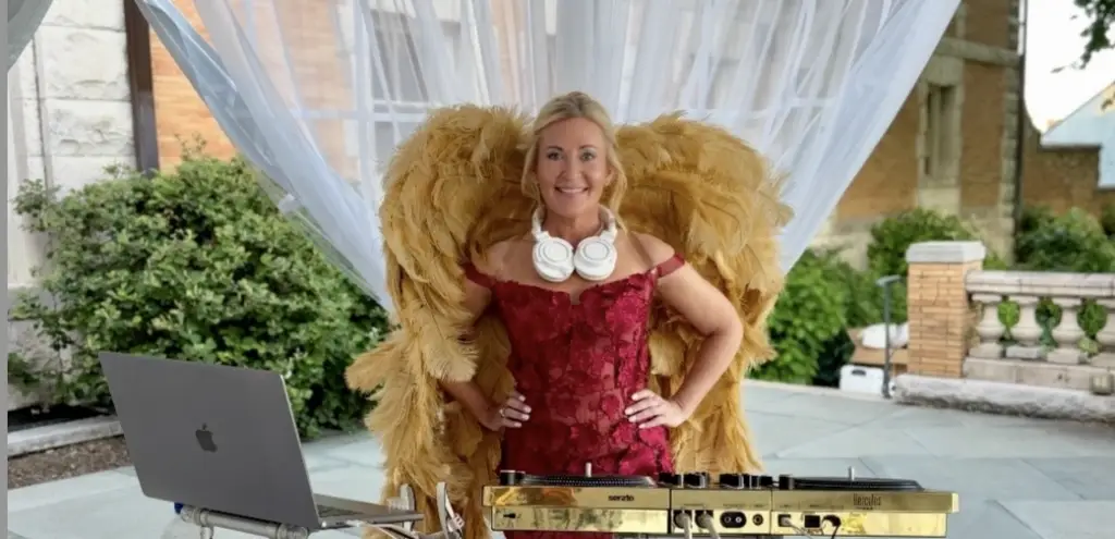 DeeJay Shelly performs at Cairnwood Estate in her signature gold wings
